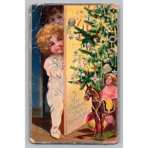 1909 Christmas Postcard Children PJs Peeking Tree Rocking Horse Embossed