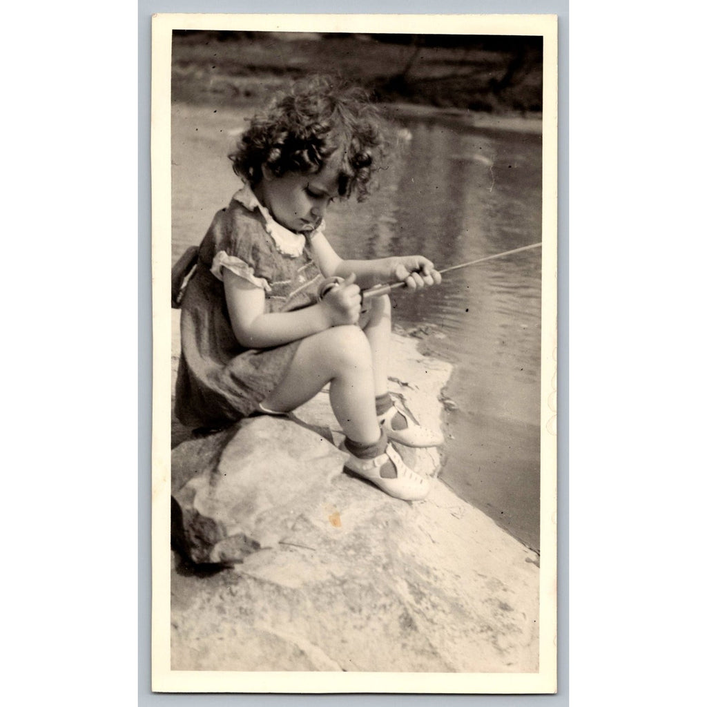 Child Girl Preschooler Fishing 1950s Snapshot Photograph Outdoors Candid Vintage