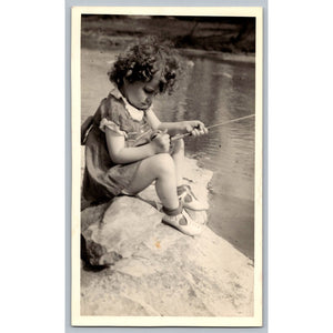 Child Girl Preschooler Fishing 1950s Snapshot Photograph Outdoors Candid Vintage